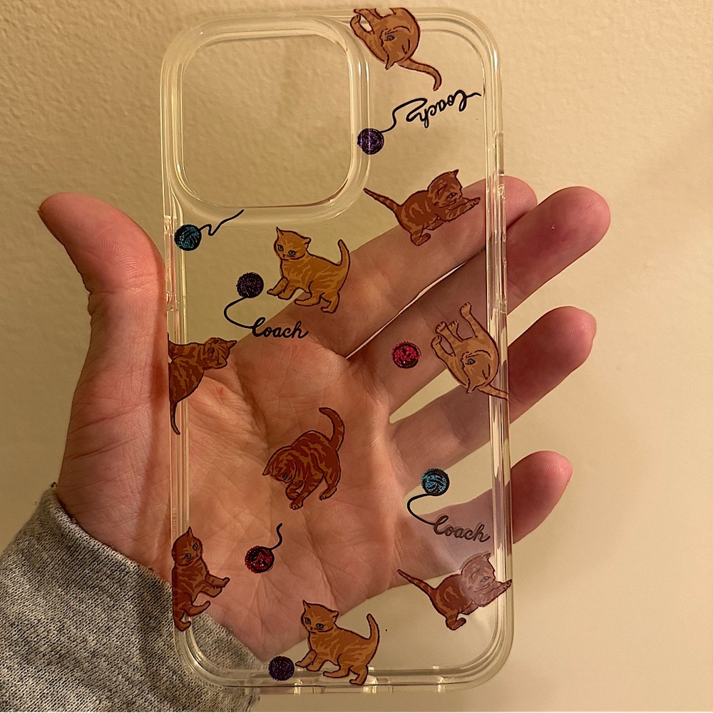 Coach Kittens & Yarn iPhone case.